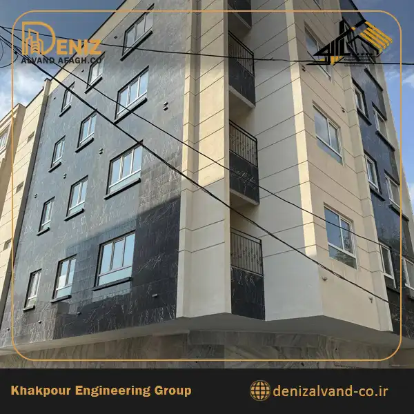 Street-level entrance and exterior finish of the completed residential project in Alborz